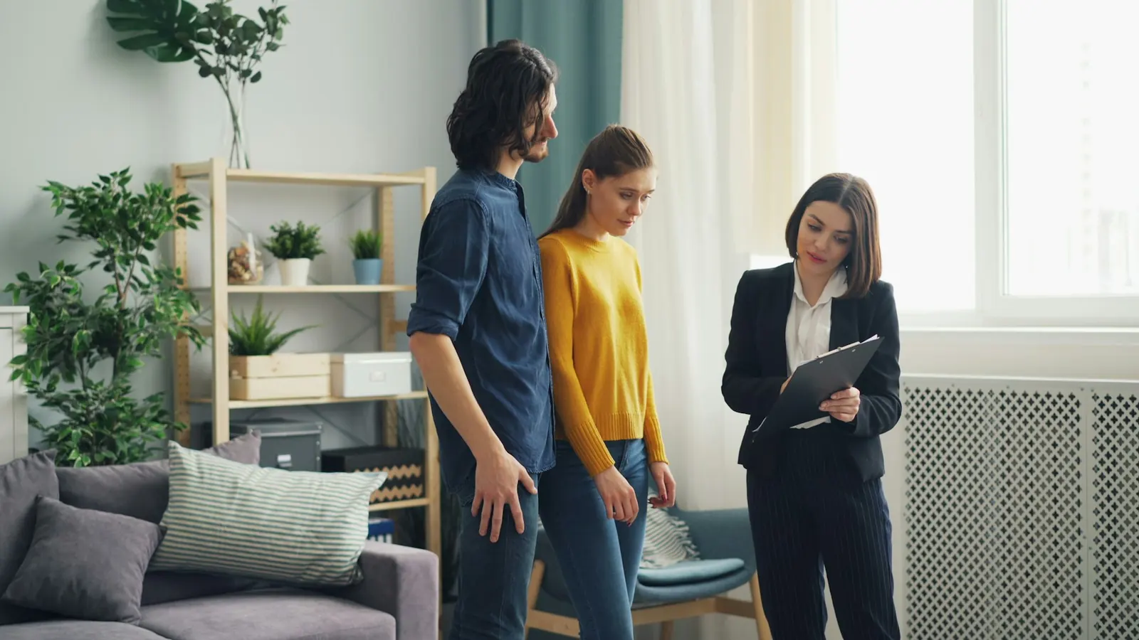 Claim professional reviewing damage details with homeowners